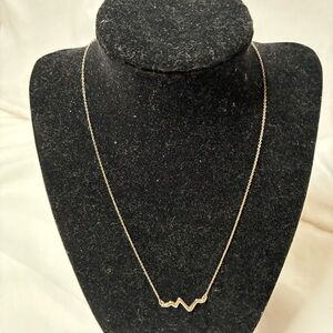 Elegant Silver Necklace with Heartbeat Pendant GUC